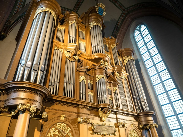 an old church is adorned with antique gold