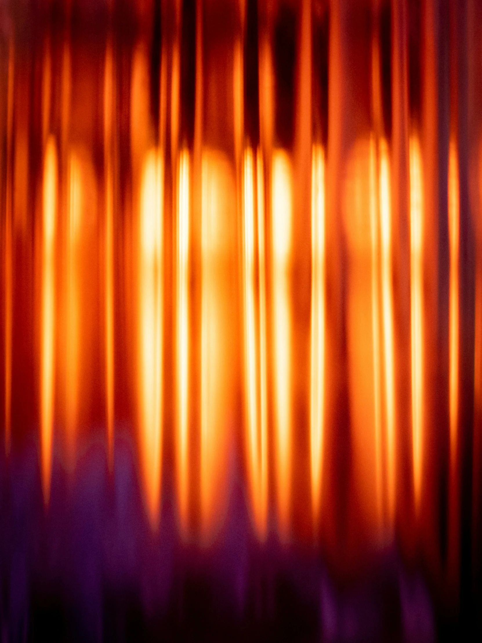 bright orange curtains being drawn across the frame