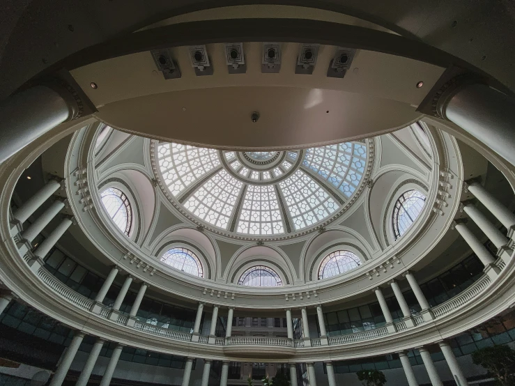 a view of a ceiling that is lit by a bright light