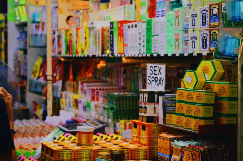 woman with her hand on the shoulder looking at products for sale