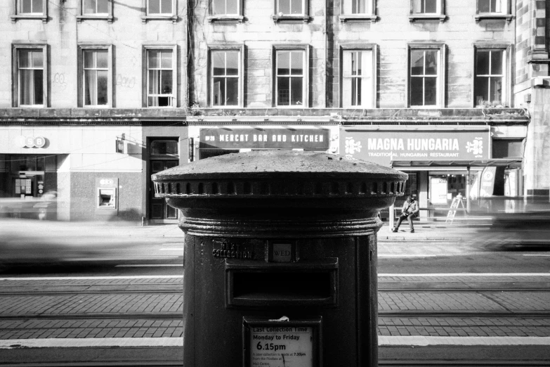 an image of a black and white po of a telephone booth