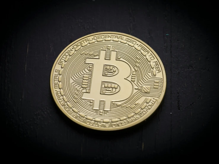 a bitcoin on a black background