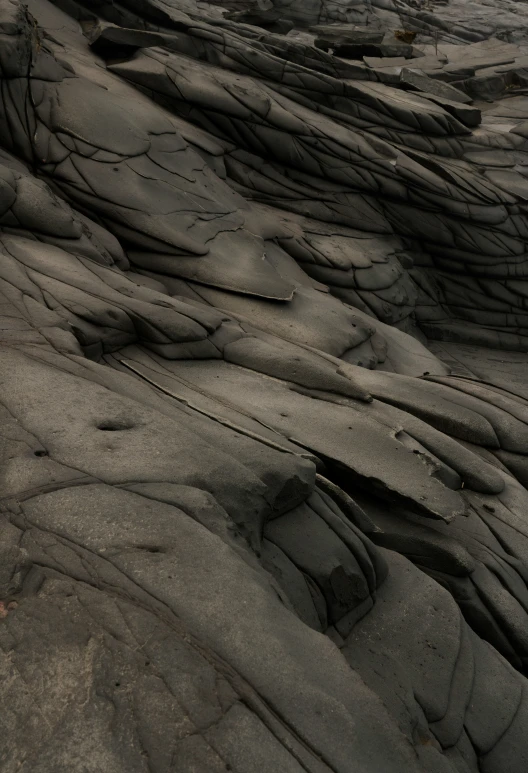 large rocks and rock formations on a rocky cliff