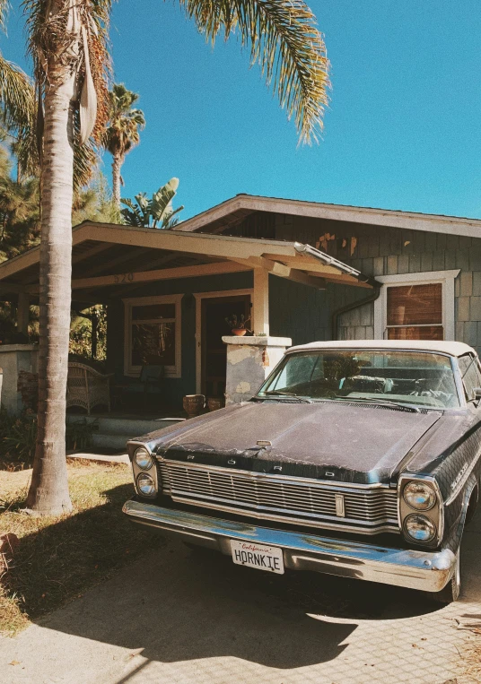 a car that is parked outside of a house