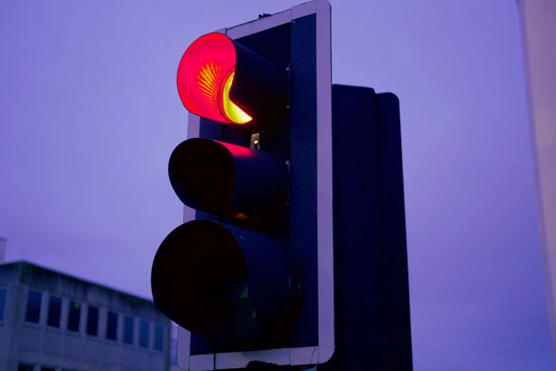 an image of a traffic light in the dark