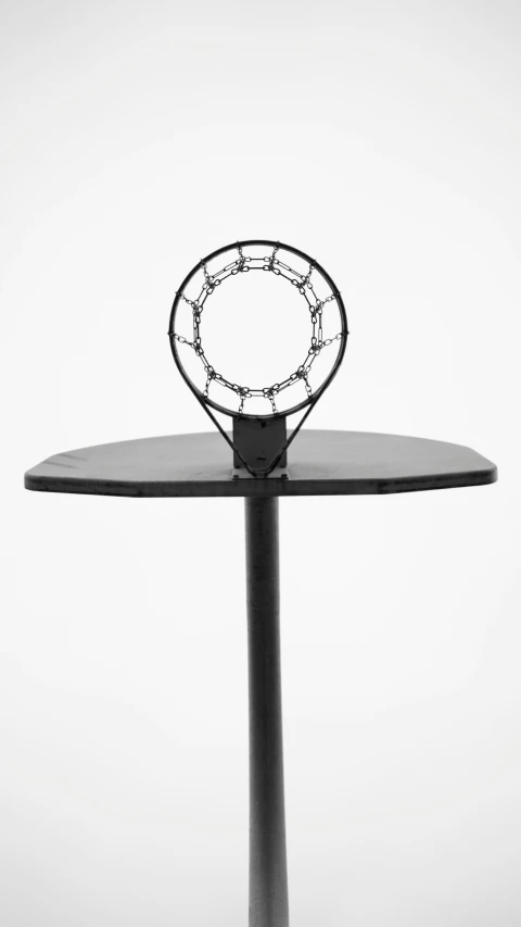 a basketball hoop on top of a round table