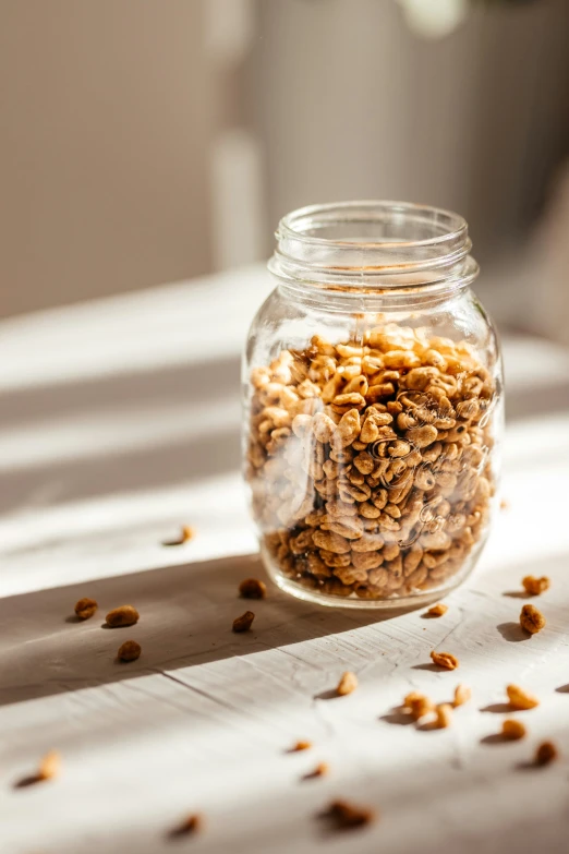 there is a glass jar filled with food