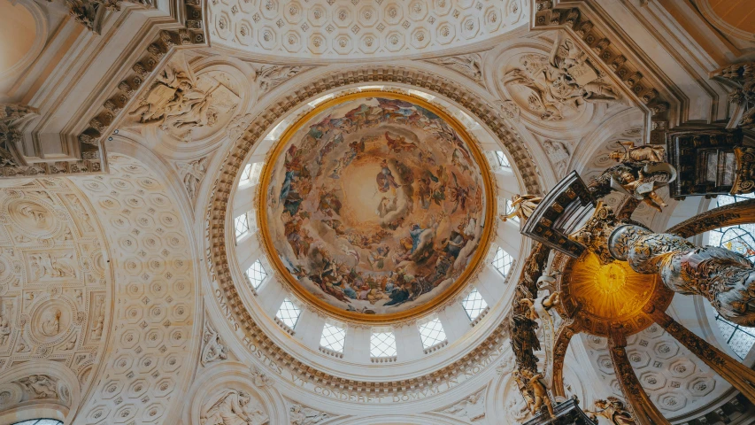 the large church is decorated with a lot of fancy gold