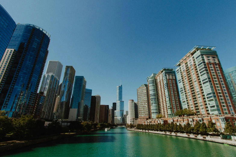 high rise buildings are near the waters edge