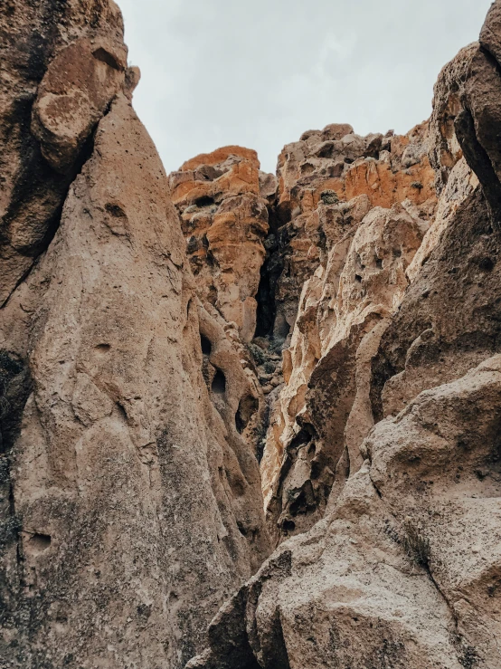 large rocks on a hill with many others