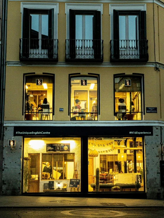 a window is lit up outside a store