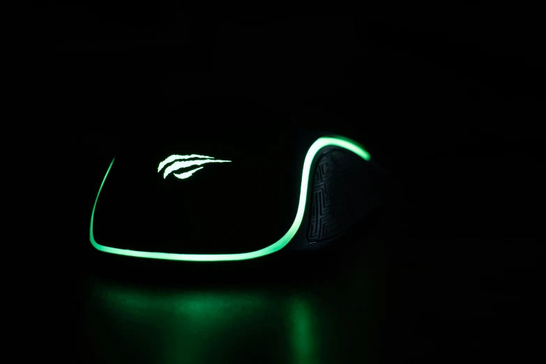 a bright mouse with green glowing light around it