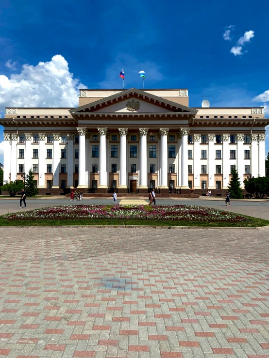 a large white building with columns and pillars