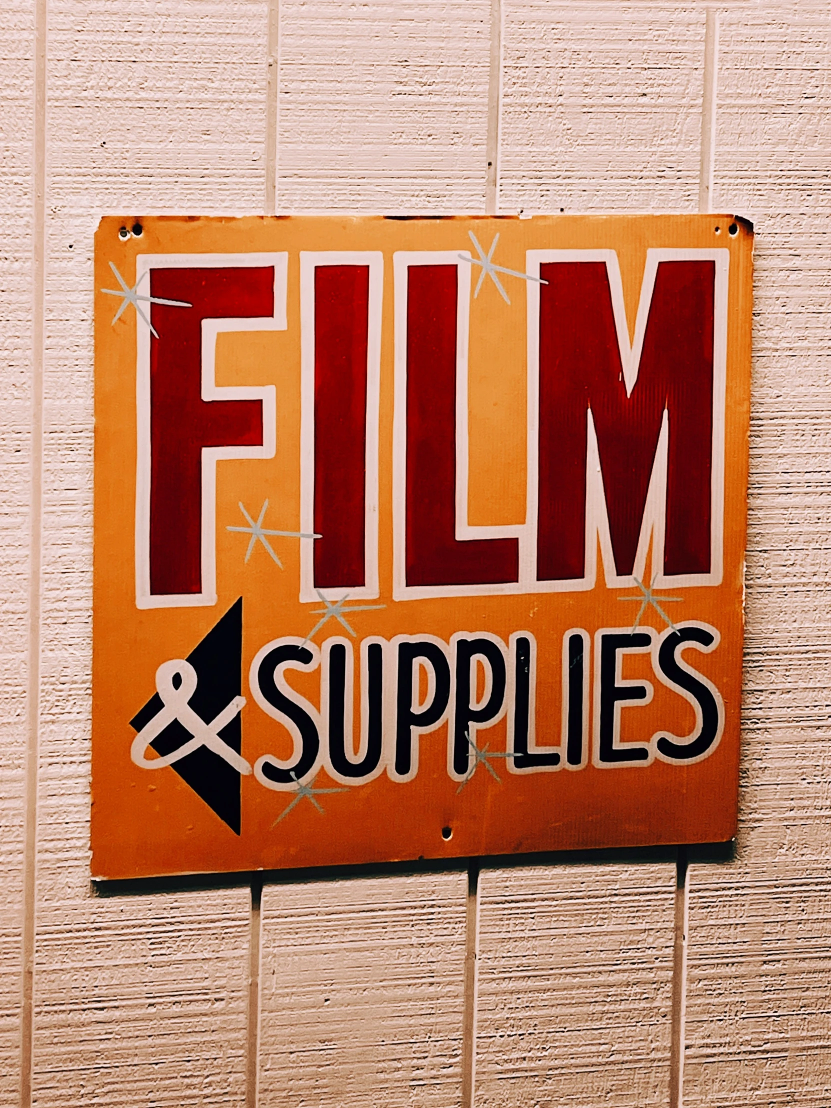 a sign is displayed on the wall to warn that there are no films