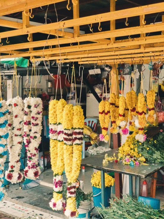 a bunch of garlands hanging from the ceiling