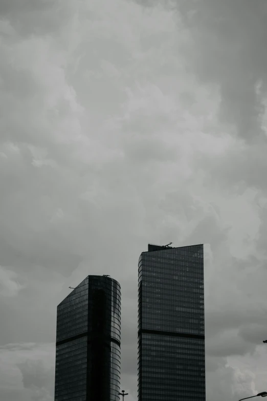 a black and white po of two large buildings