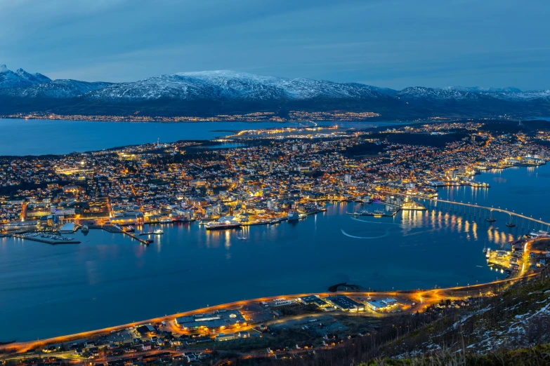 a large body of water next to a city