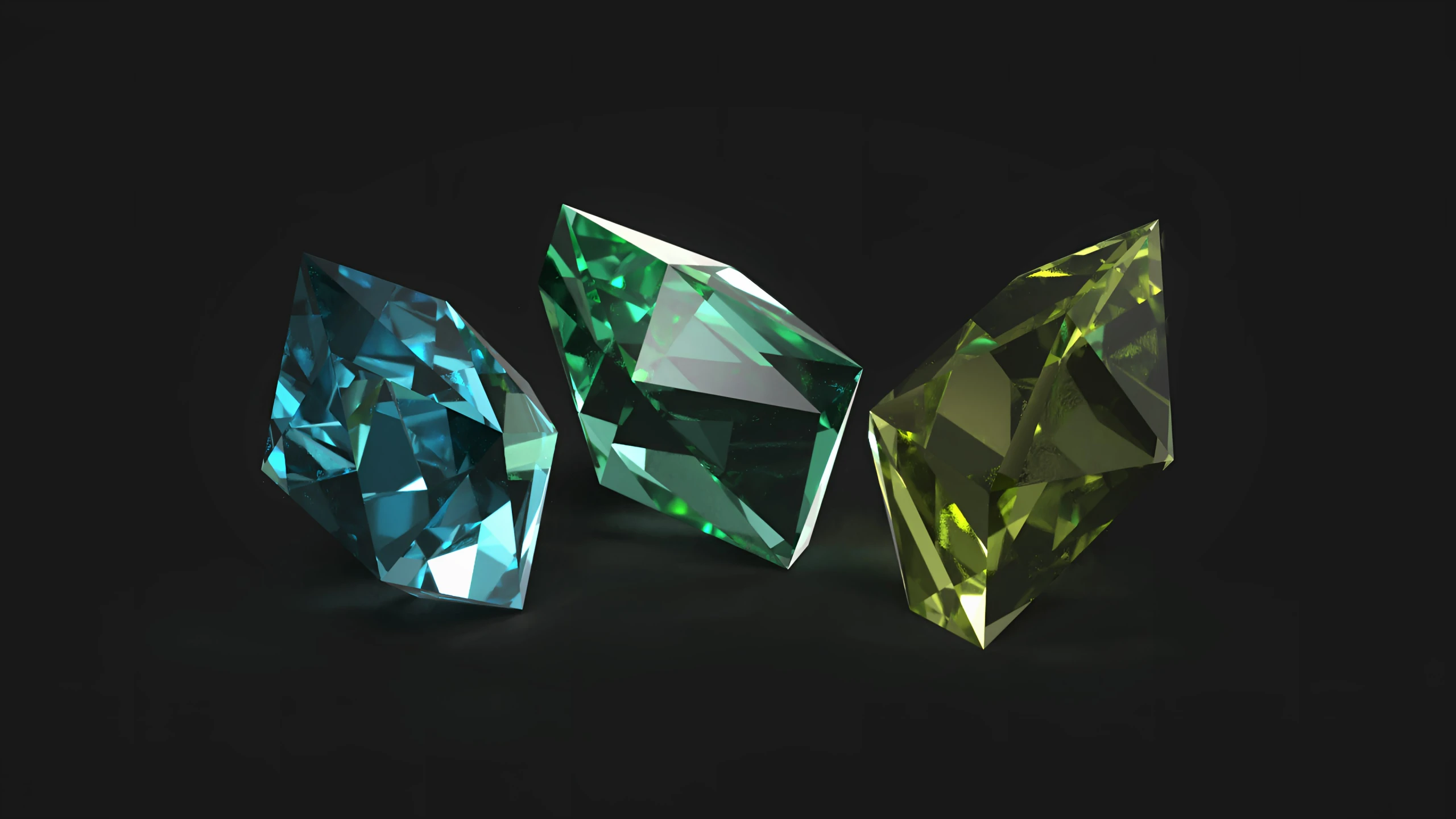 three different colored diamonds against a black background