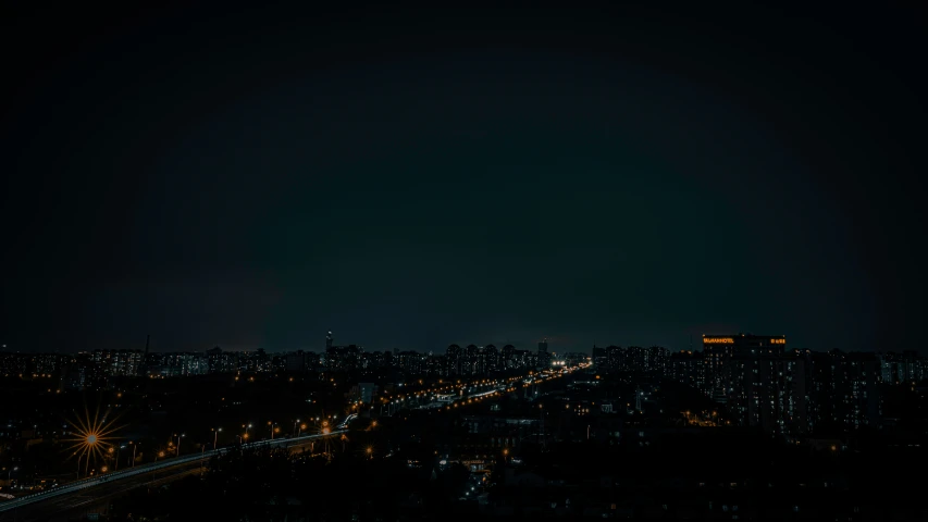 view of a city from an observation deck at night