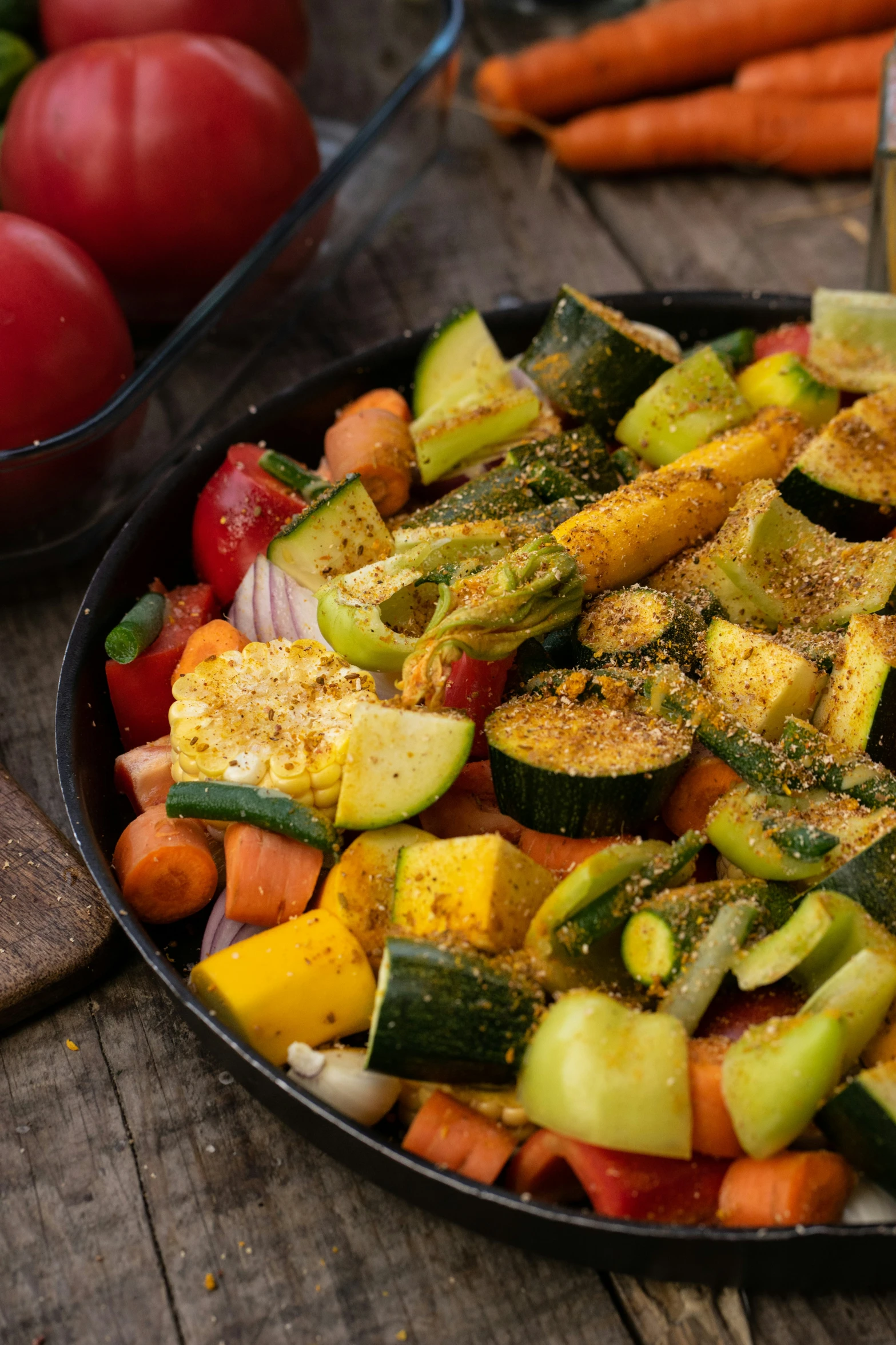 this is a pan of sliced vegetables on a table