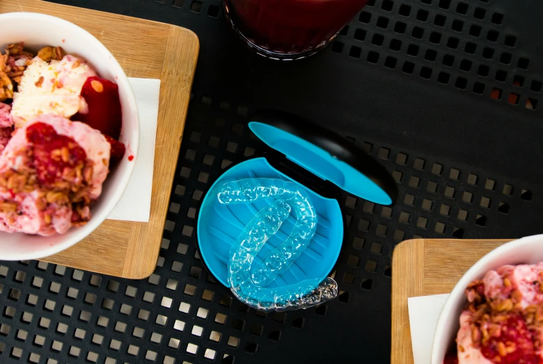 three small bowls with different food in them