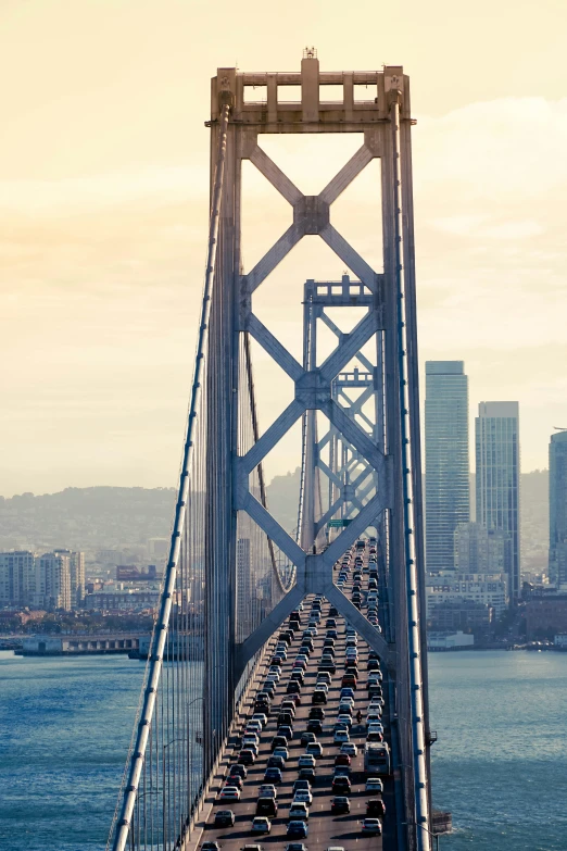 cars moving on the same line of traffic going over the bay bridge