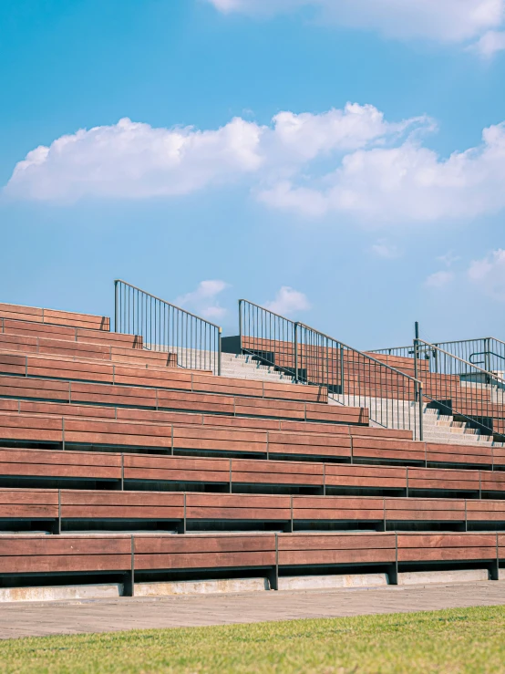 the brown seats on this stadium are empty