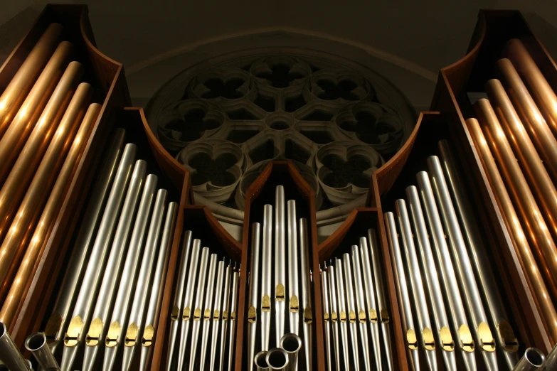 a view of the back side of a pipe organ