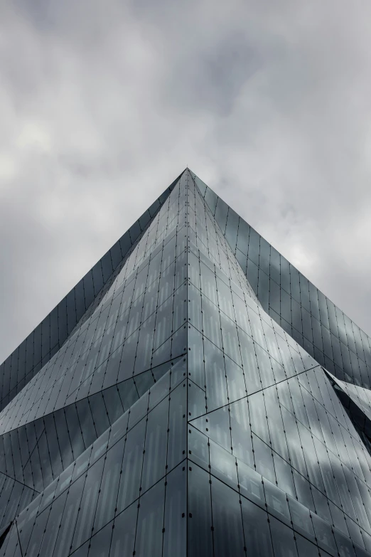 the top of a building with an arrow on it