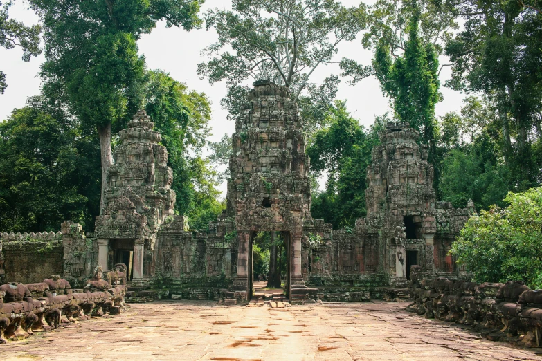 a large stone building surrounded by trees