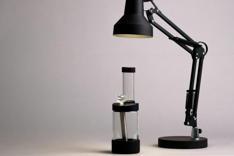 an industrial style table lamp and a lighter