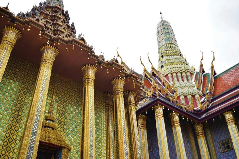 a tall tower with many intricate gold decorations