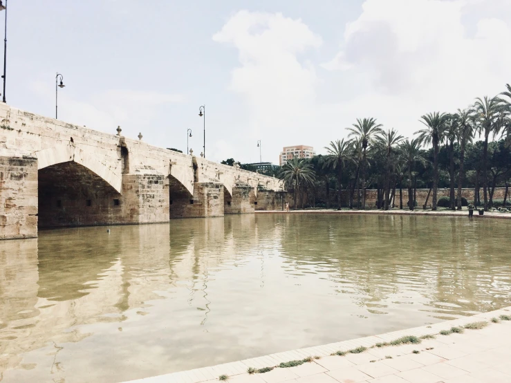 a large body of water near a bridge