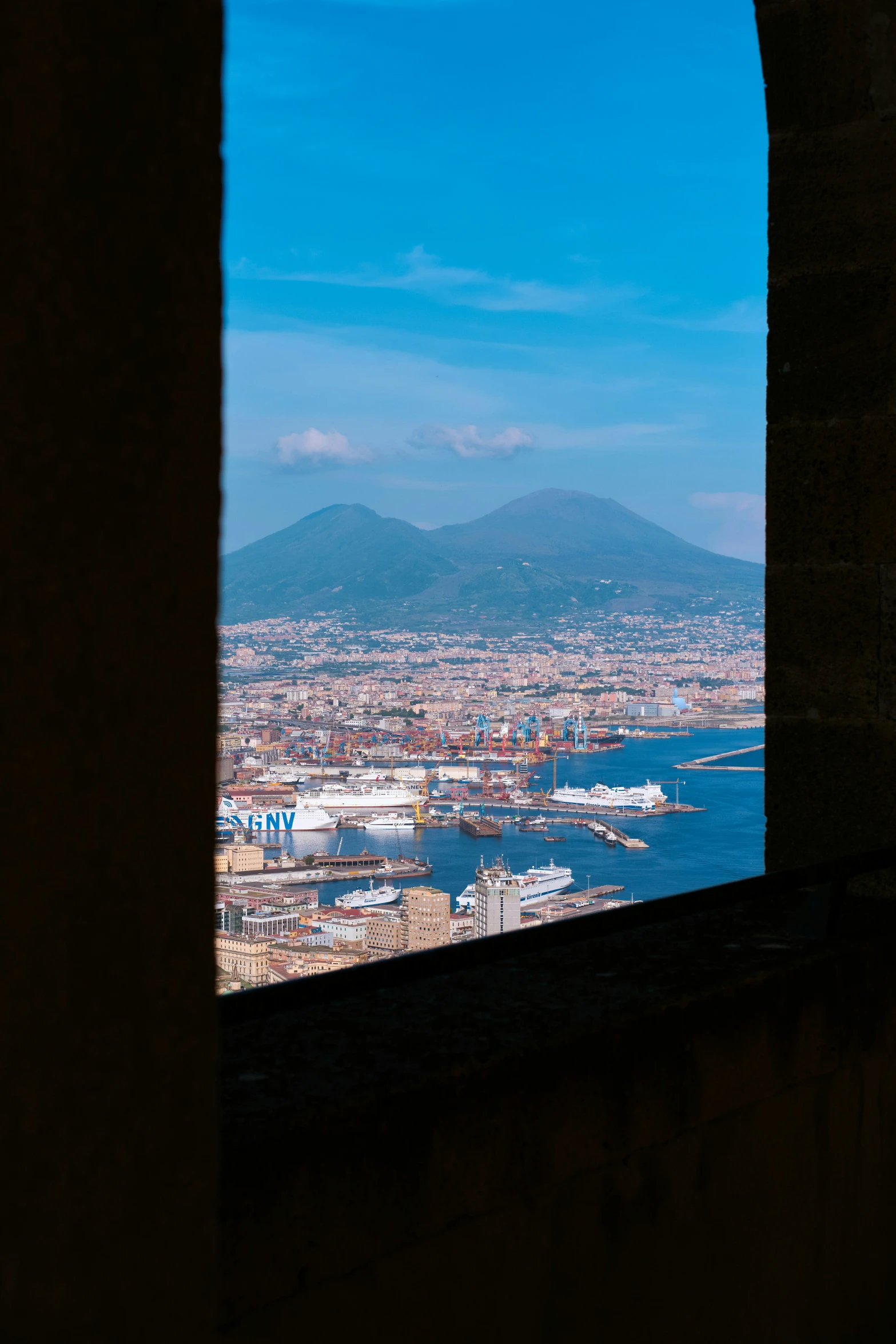 view of the city and lake from a window