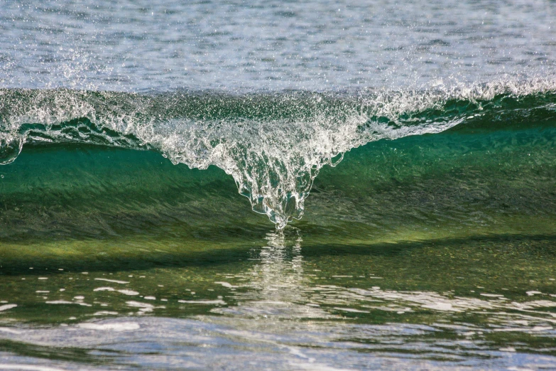 the water is crystal bright blue and clear