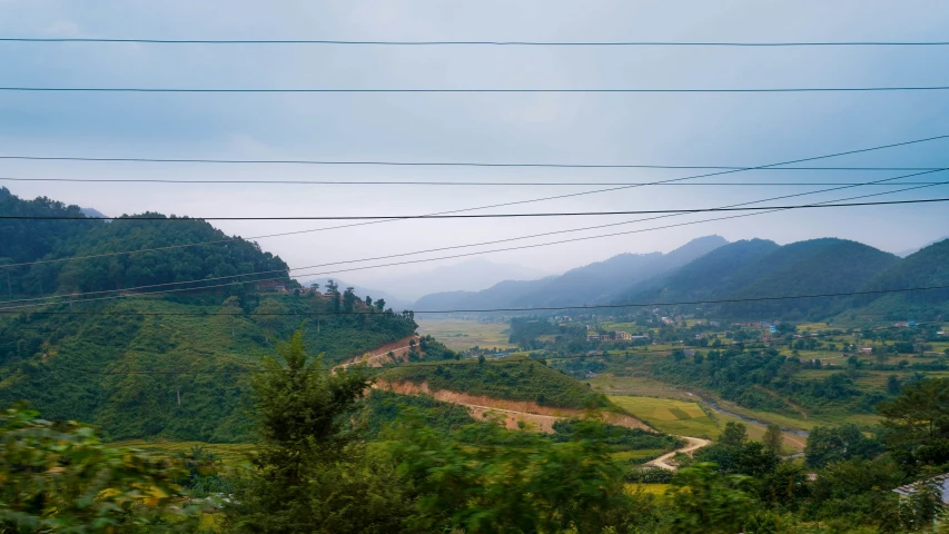 a landscape view in a country side is covered in green