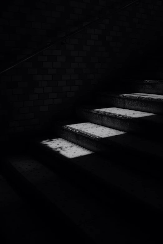 the shadow of a stairway on some stairs