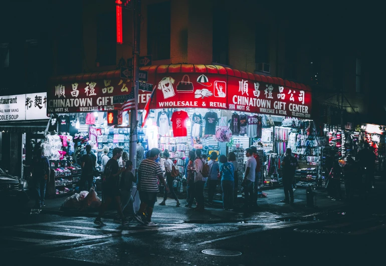 there are many people standing outside in the street