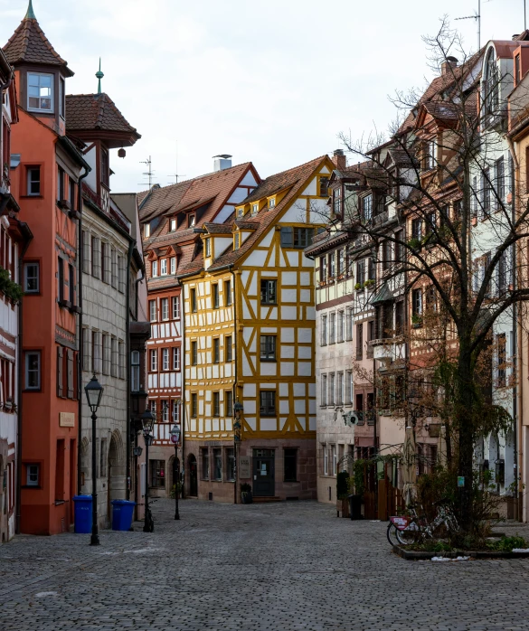 several buildings with different colors line the streets