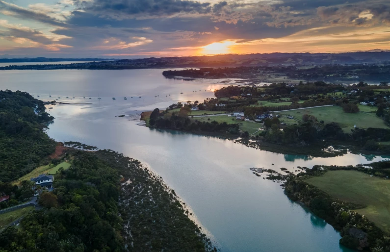 a sunset over a body of water