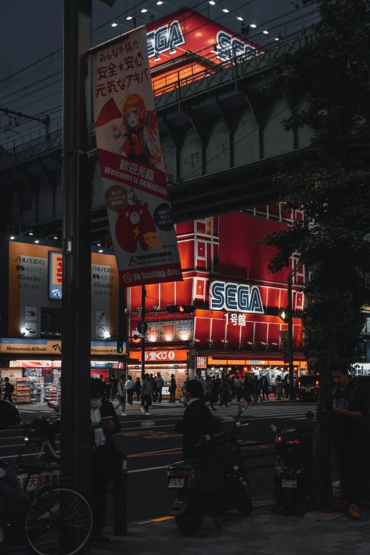 a nighttime scene shows a busy market at the end of the night