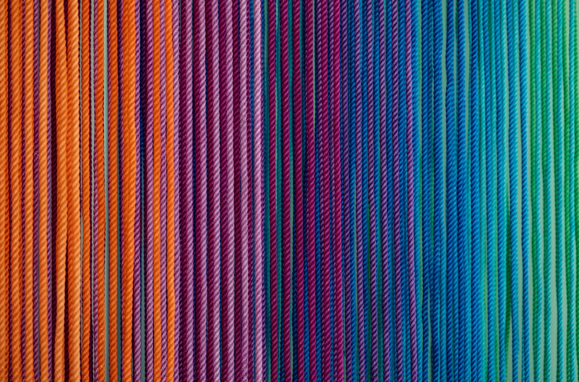 abstract rainbow colored lines with focus on one end