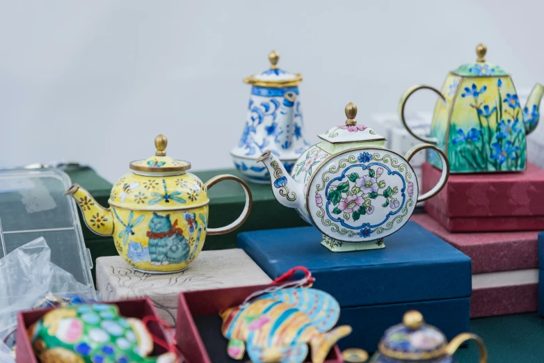 a closeup of a tea pot and tea cups