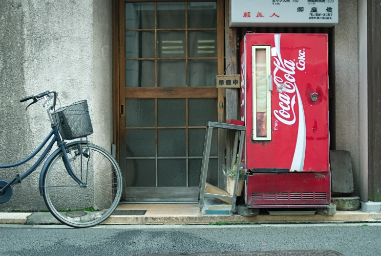 a bicycle parked in front of an old building