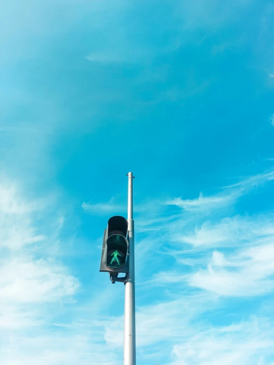 there is a traffic light on a pole