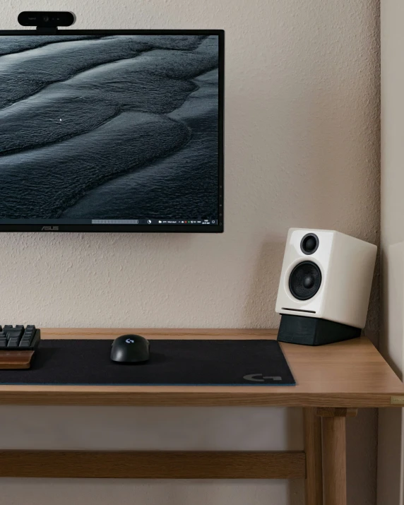 there is a desktop computer on top of a desk