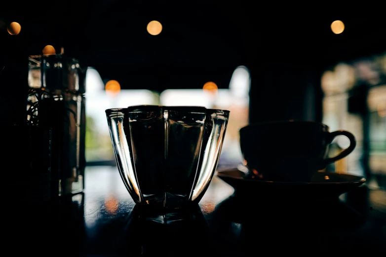 the view from a counter looking at a cup and saucer