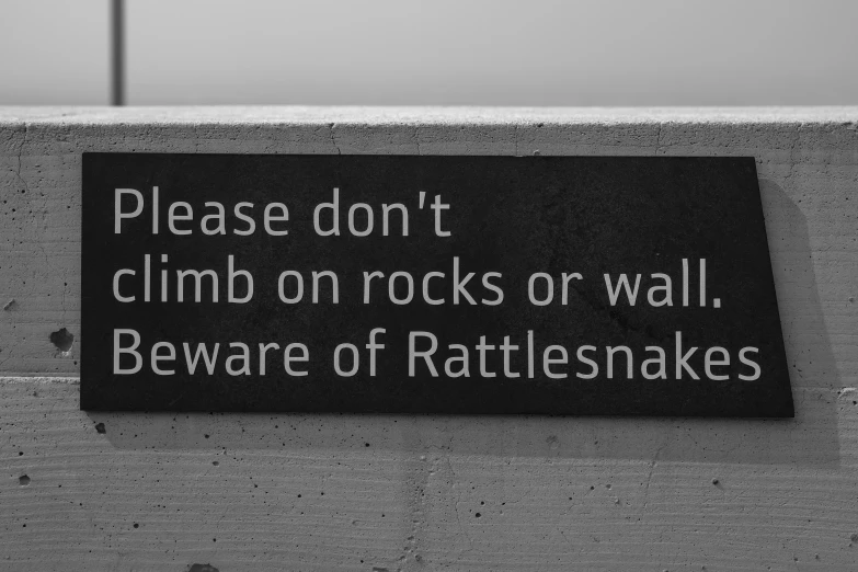 a sign written on the side of a wall