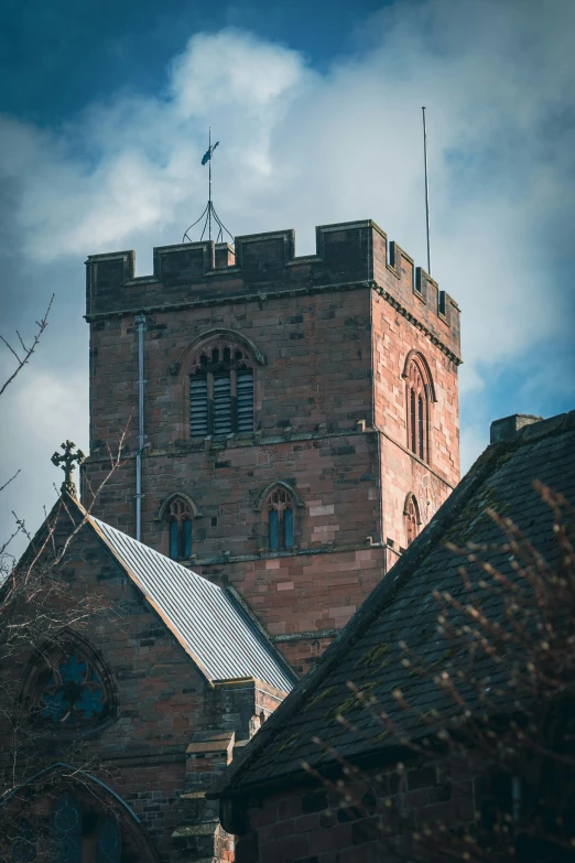 an old building with a tower with a clock on it