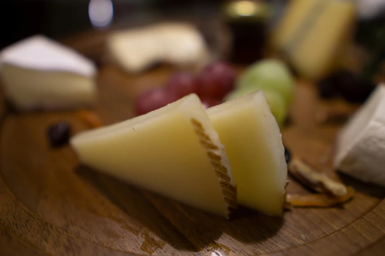 some food is laying on top of a wood plate